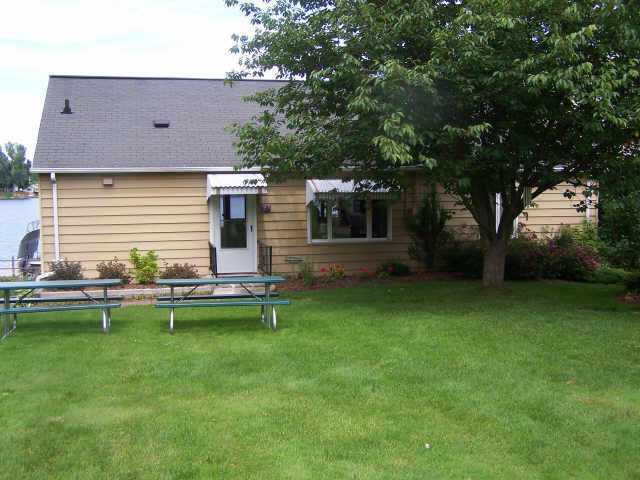 11697 Tompkins Point Road Wolcott, NY 14590 - Photo 1 of 1 Exterior Front Welcome to 11697 Tompkins Point on