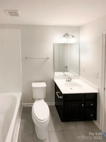 a view of a hallway with stairs