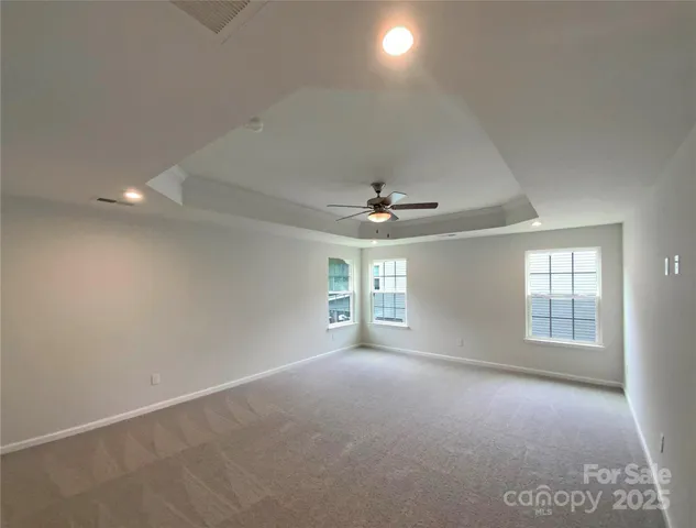 a bathroom with a sink a shower and a mirror