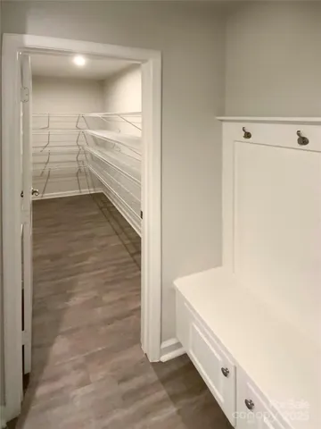 a view of an empty walk in closet