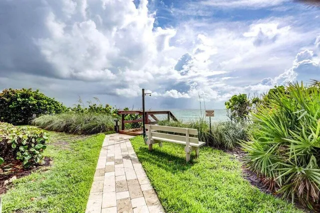 a view of an outdoor space and tennis court