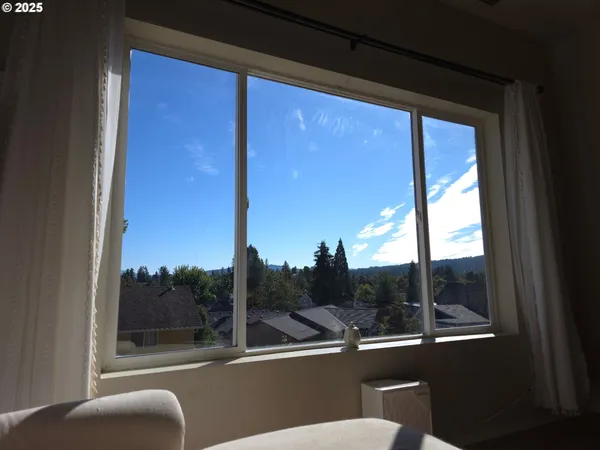 a view of a balcony with chair