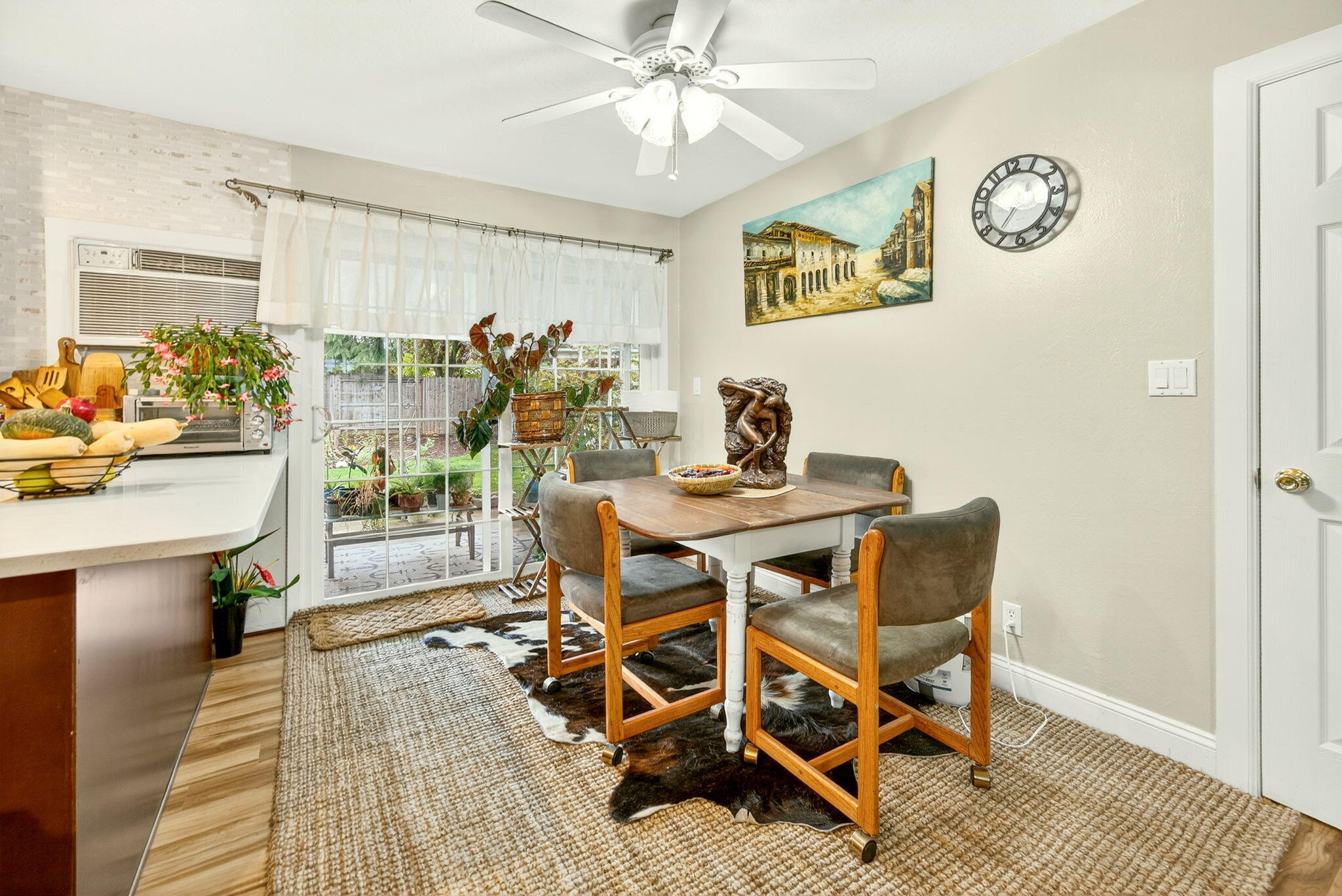 659 Herman Avenue Medford, OR 97501 - Photo 22 of 42 a view of a dining room with furniture window and wooden floor