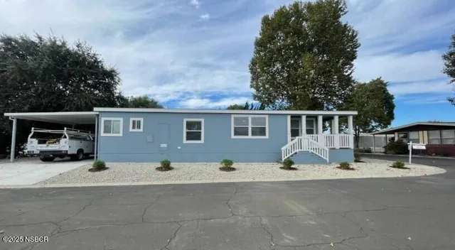 front view of a house with a street