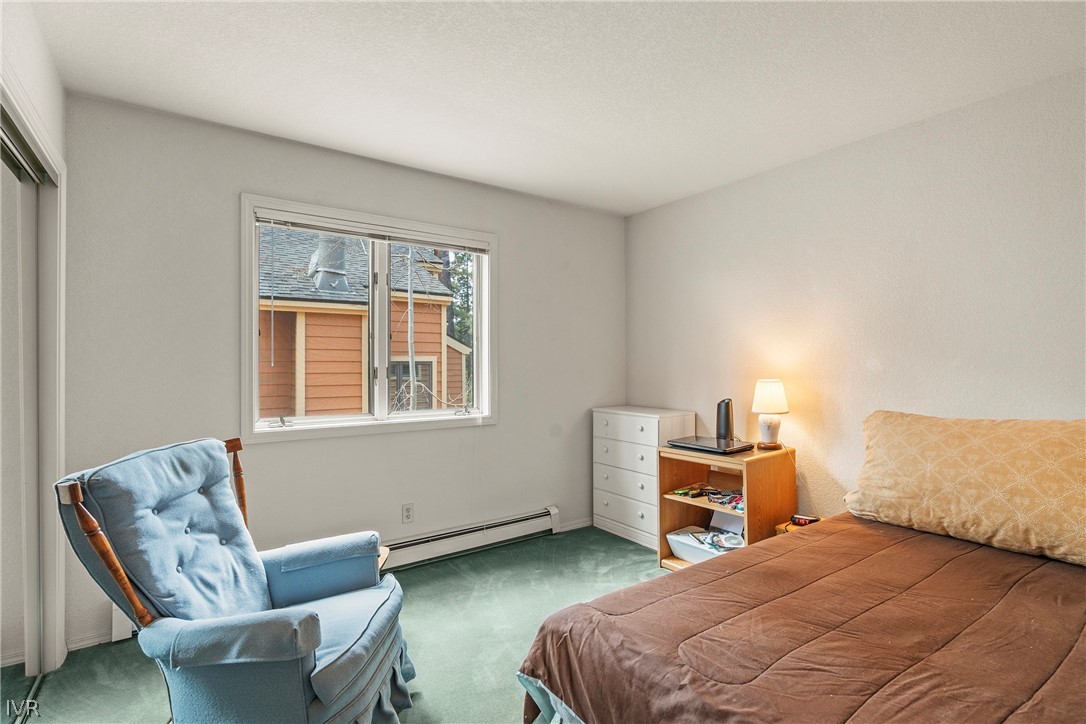 947 Incline Way, Unit 183 Incline Village, NV 89451 - Photo 16 of 37 a bedroom with a bed and a window