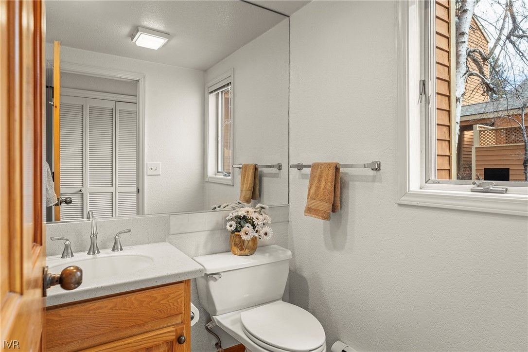 947 Incline Way, Unit 183 Incline Village, NV 89451 - Photo 10 of 37 a bathroom with a sink toilet and mirror