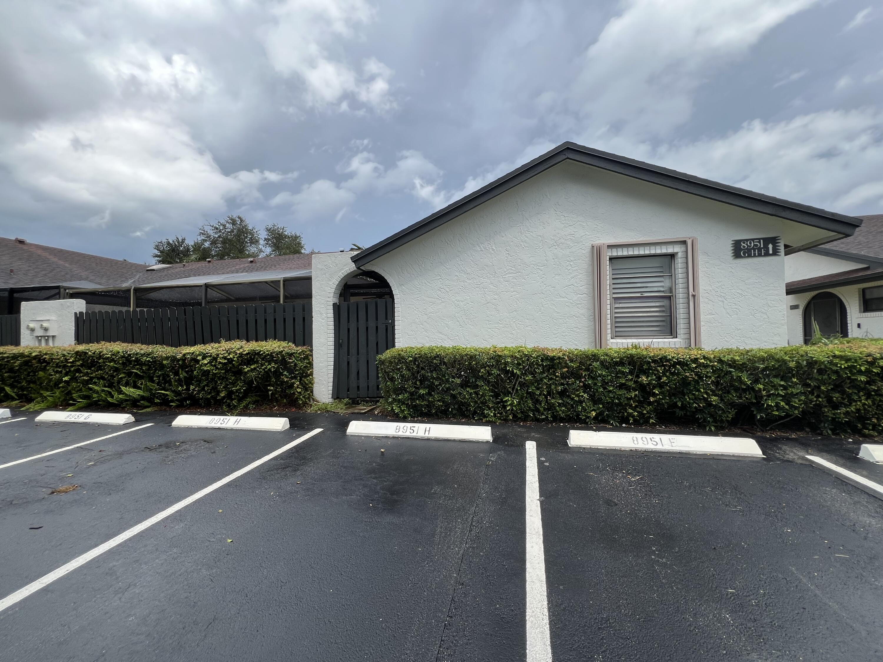 8951 Southwest 19th Street, Unit G Boca Raton, FL 33433 - Photo 24 of 30 Exterior & Assigned Parking