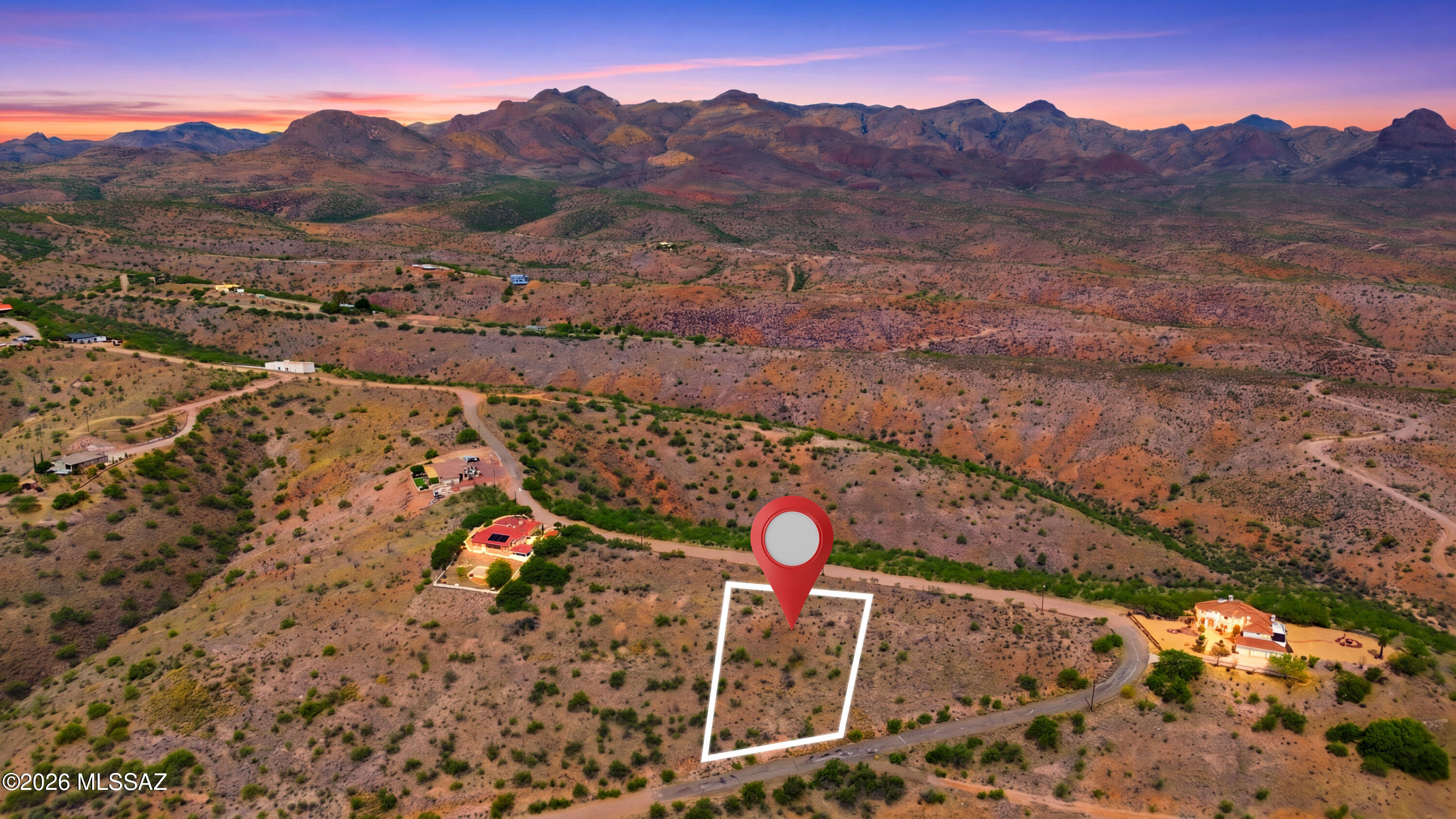 1525 Circulo Jacona, Unit 32 Rio Rico, AZ 85648 - Photo 3 of 13 a view of a field with mountains in the background