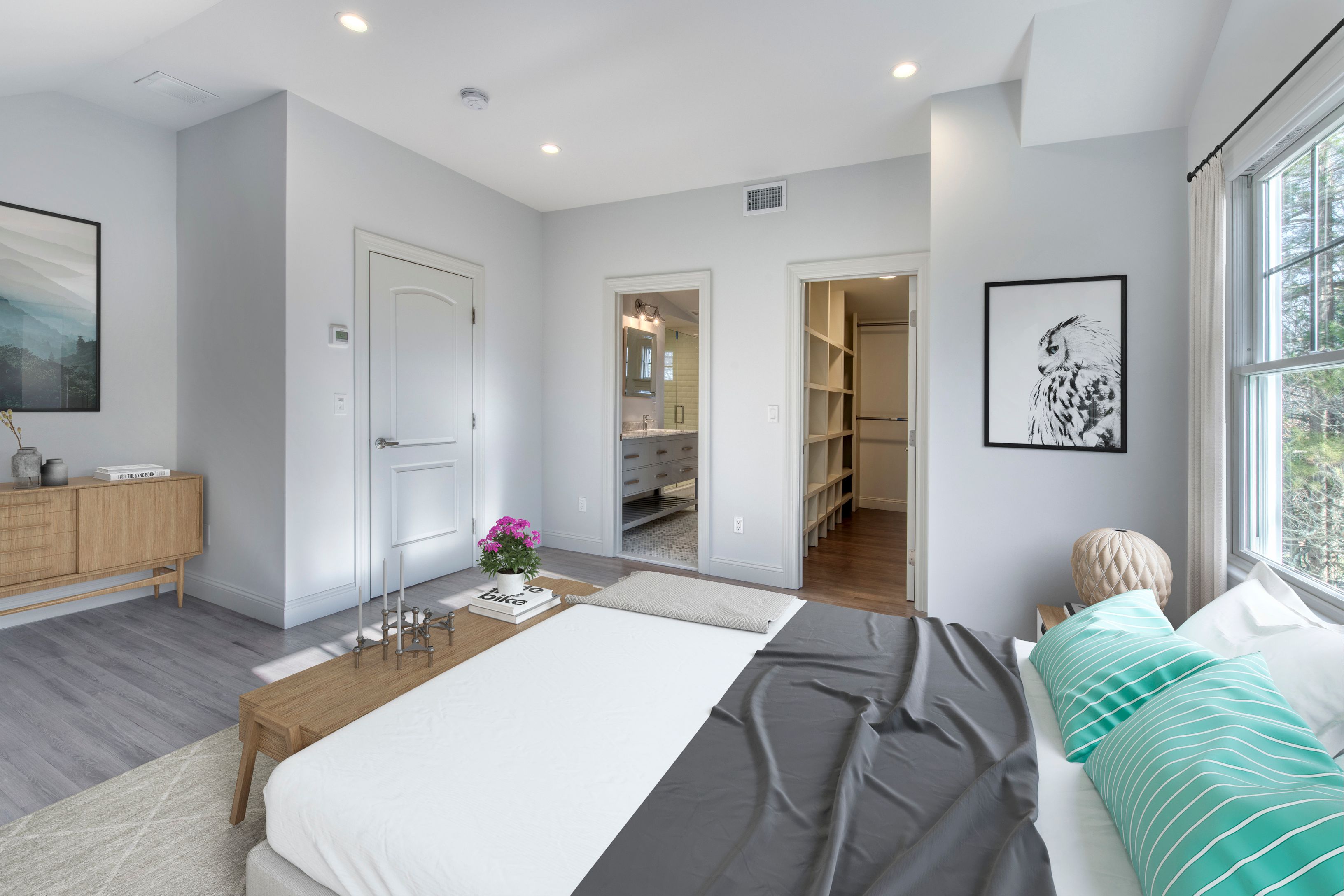 134 Beach Road Westhampton Beach, NY 11978 - Photo 11 of 16 a bedroom with a bed and a flat screen tv