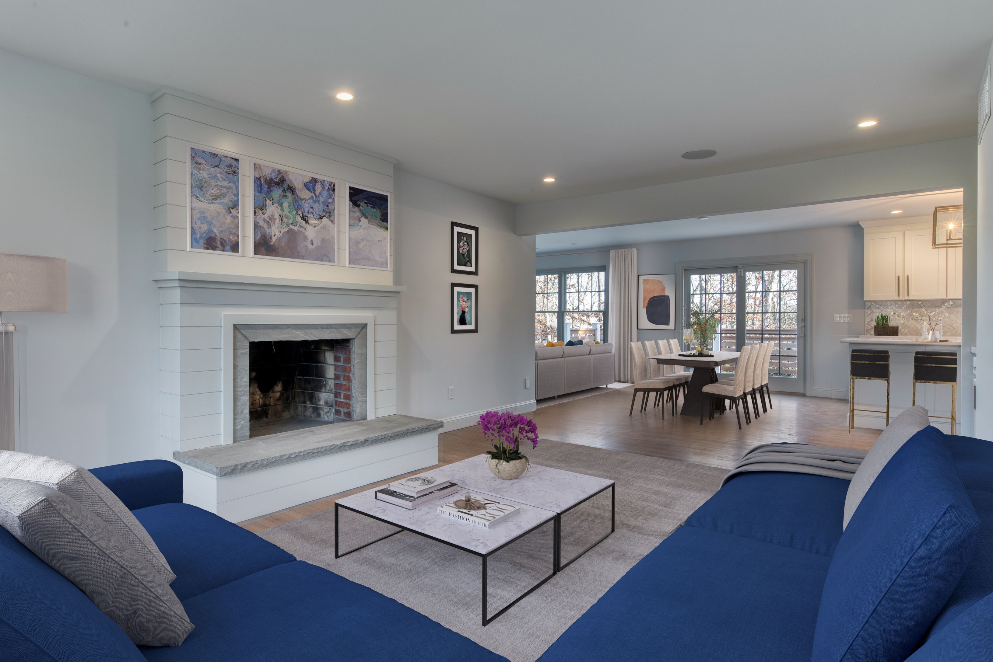 134 Beach Road Westhampton Beach, NY 11978 - Photo 4 of 16 a living room with furniture a table and a fireplace