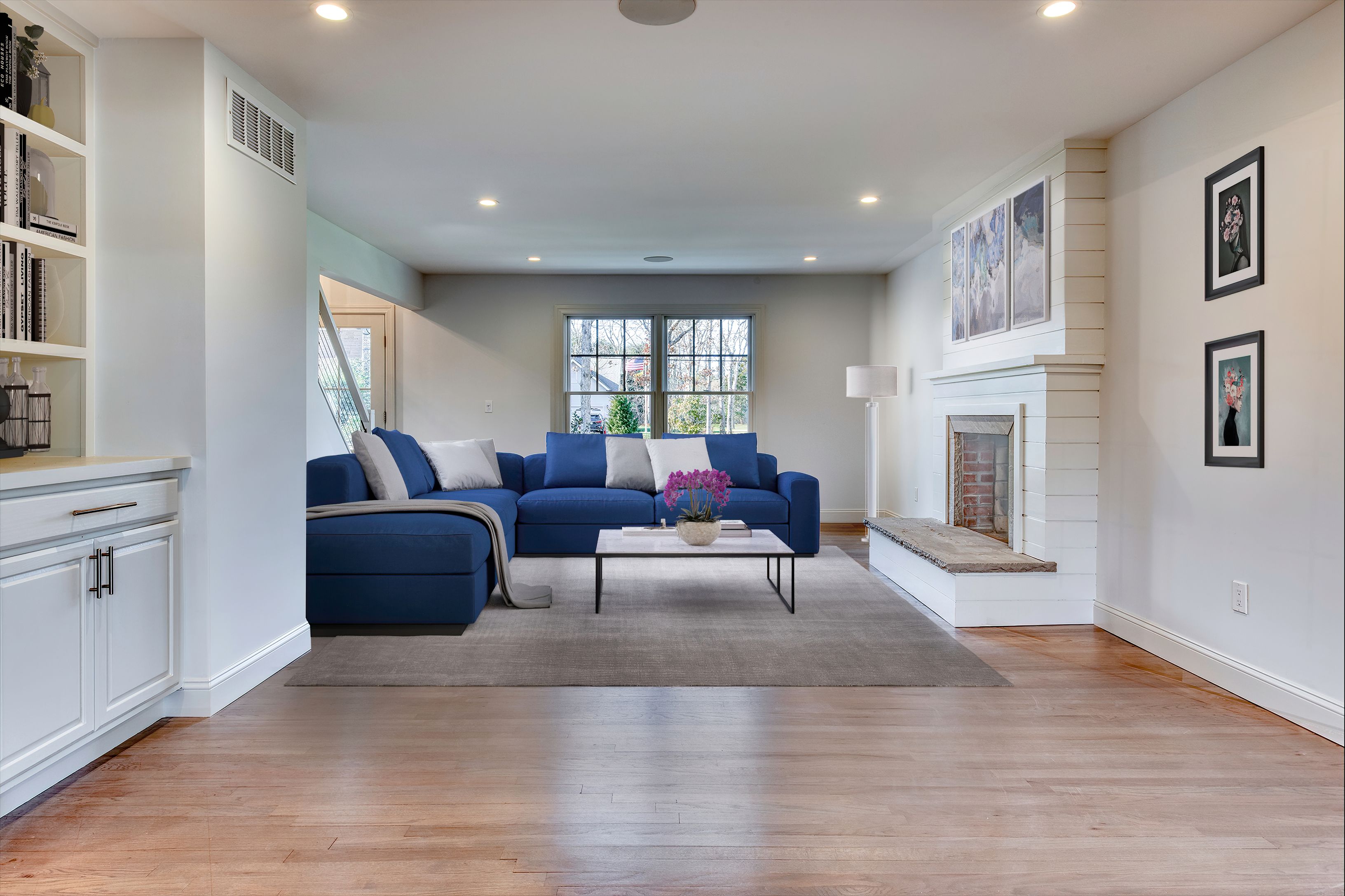 134 Beach Road Westhampton Beach, NY 11978 - Photo 5 of 16 a living room with furniture and a fireplace