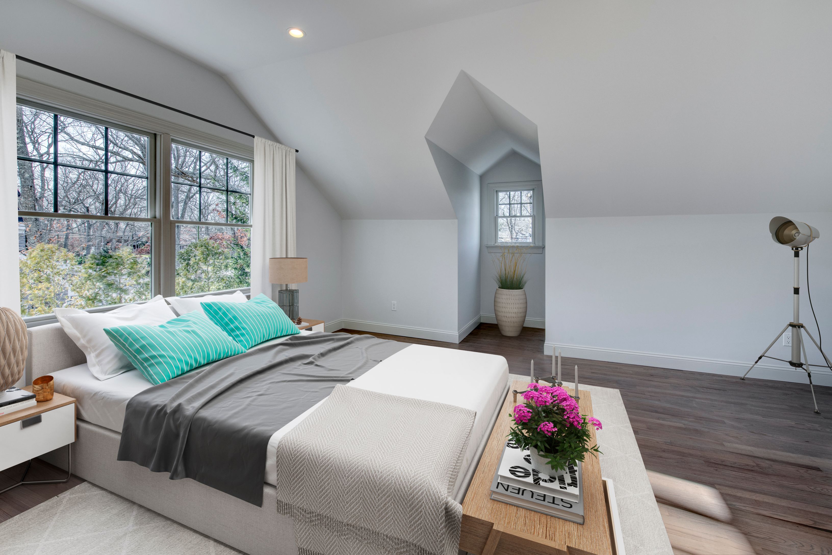 134 Beach Road Westhampton Beach, NY 11978 - Photo 10 of 16 a bedroom with a bed a dresser and a large window