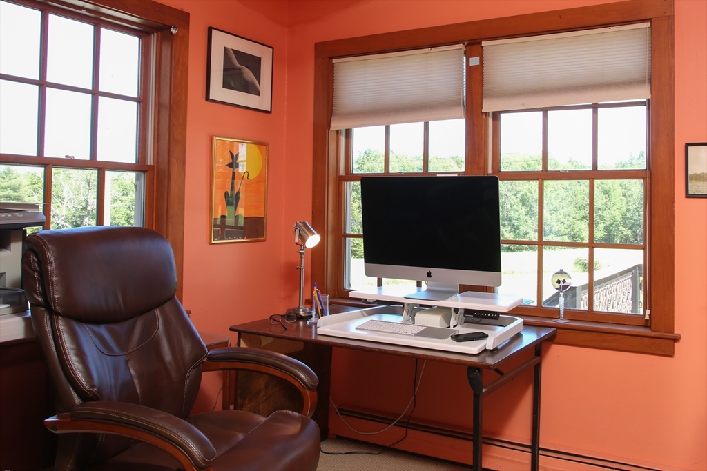 5 State Farm Road Heath, MA 01340 - Photo 12 of 42 a view of a workspace with furniture and a window