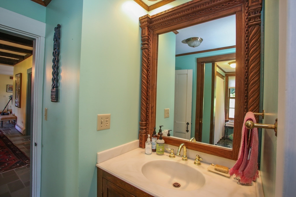 5 State Farm Road Heath, MA 01340 - Photo 20 of 42 a bathroom with a sink and a mirror