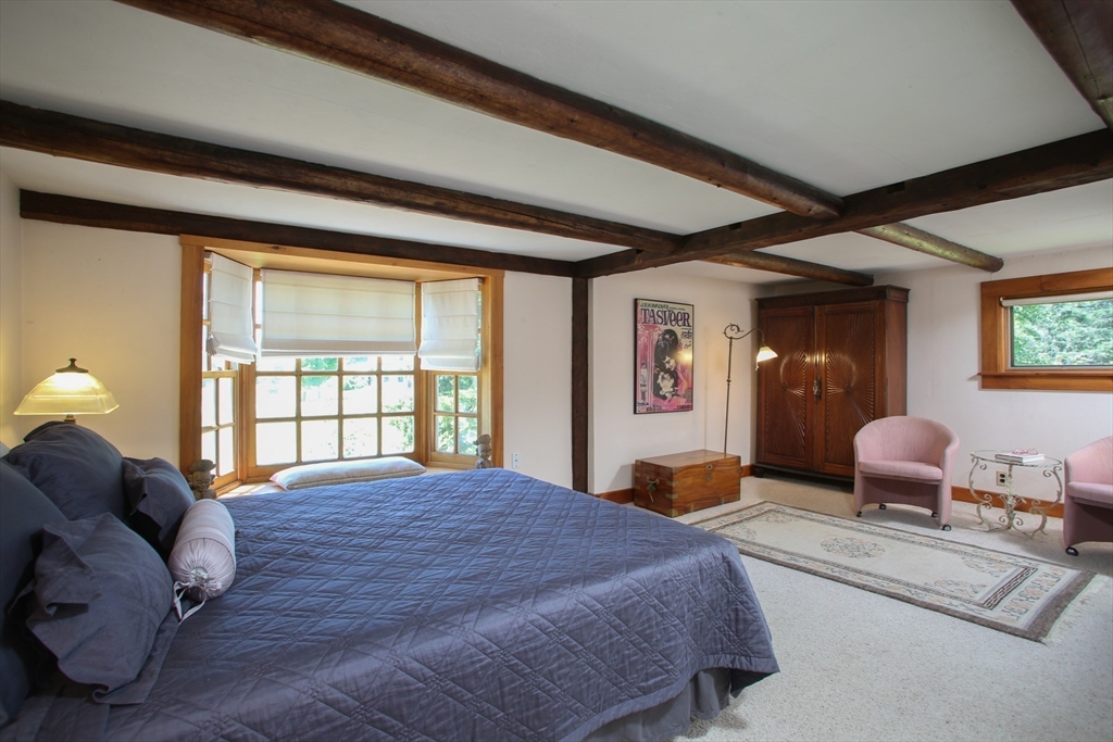 5 State Farm Road Heath, MA 01340 - Photo 31 of 42 a bedroom with a large bed and two large window