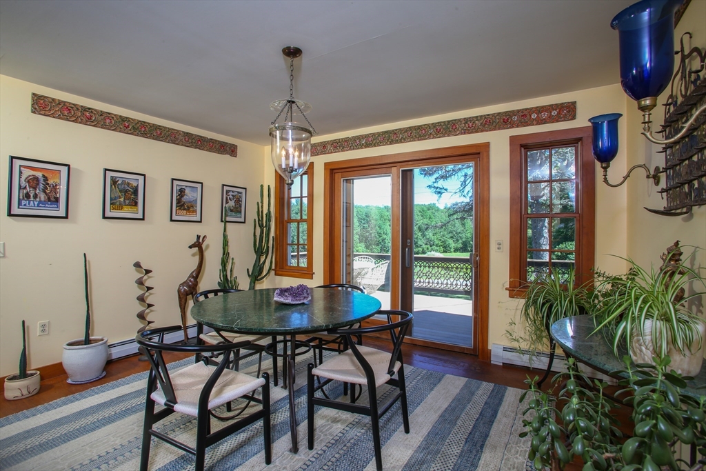 5 State Farm Road Heath, MA 01340 - Photo 9 of 42 a view of a dining room with furniture window and wooden floor