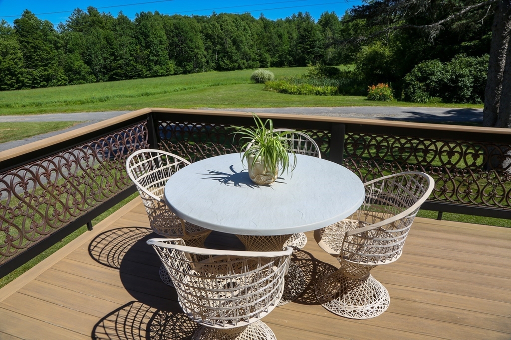 5 State Farm Road Heath, MA 01340 - Photo 10 of 42 a outdoor sitting area with furniture and wooden floor