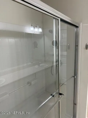 a view of a lake with a house