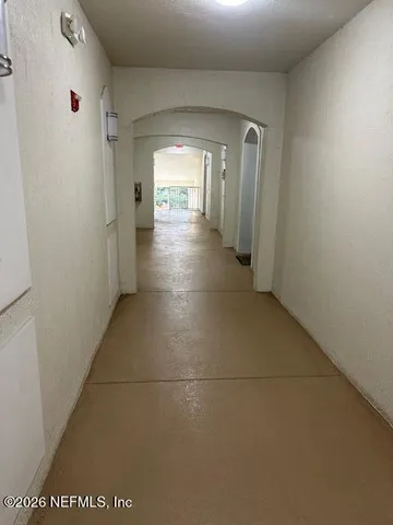 a view of balcony with wooden floor