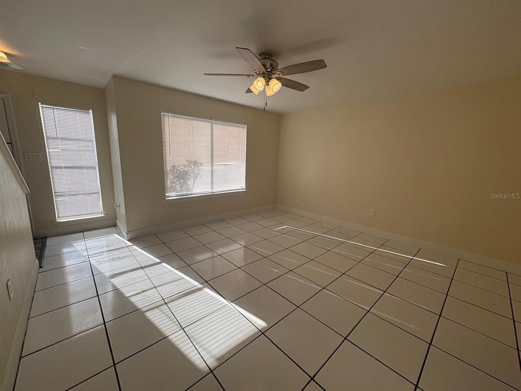 4033 Henley Road, Unit 1707 Orlando, FL 32839 - Photo 24 of 66 a view of an empty room and window