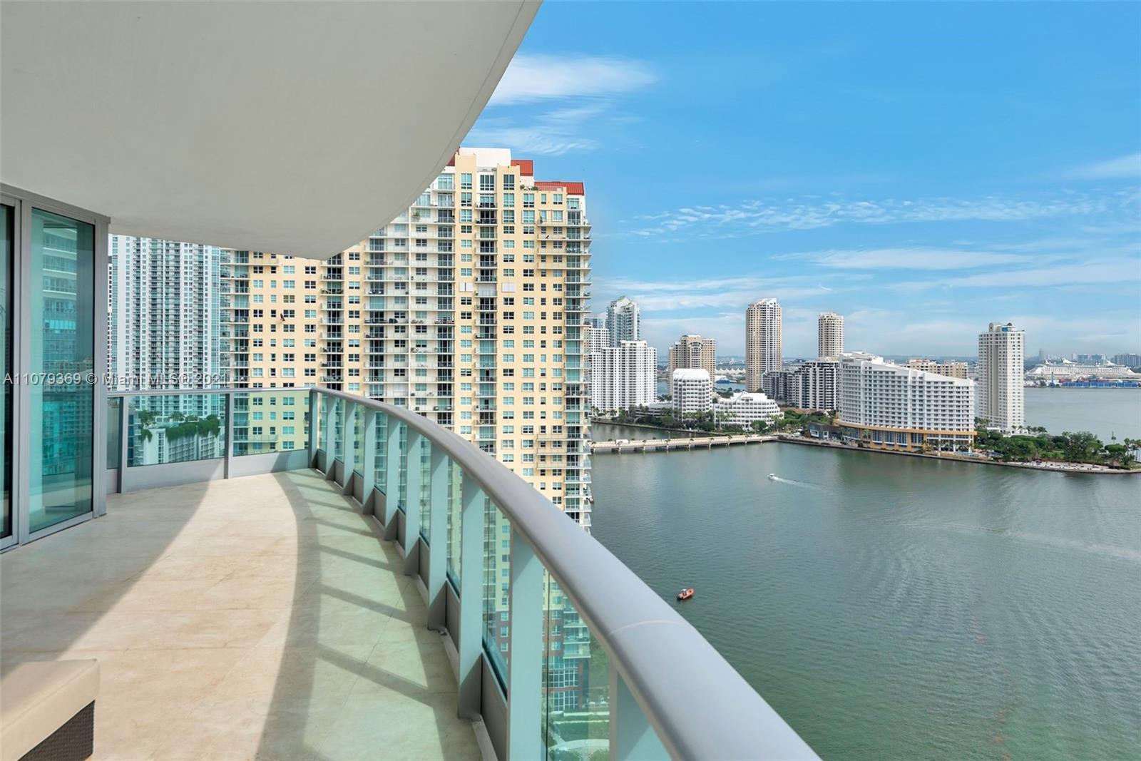1331 Brickell Bay Drive, Unit 2401 Miami, FL 33131 - Photo 2 of 52 a view of swimming pool from a balcony