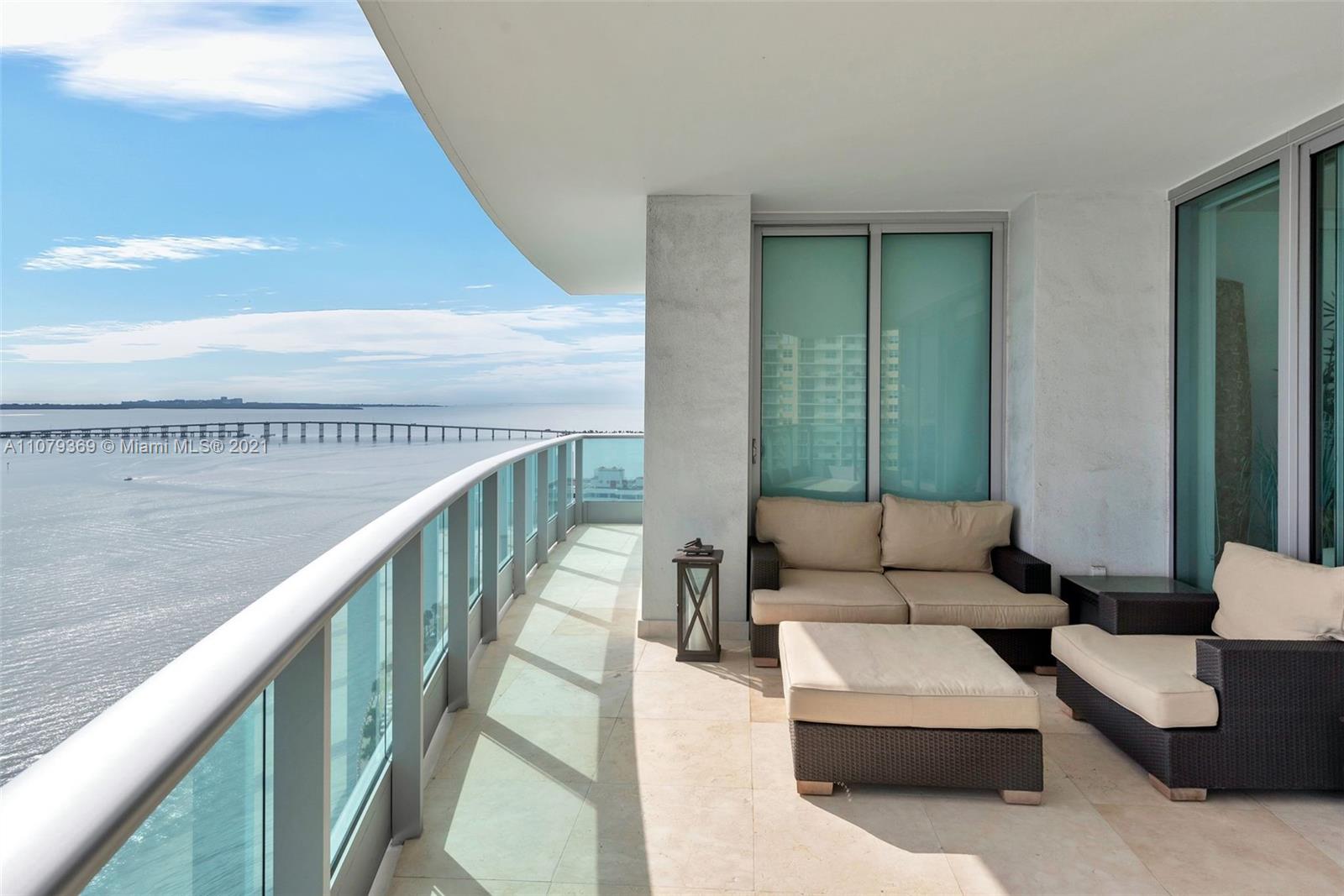 1331 Brickell Bay Drive, Unit 2401 Miami, FL 33131 - Photo 21 of 52 a living room with furniture