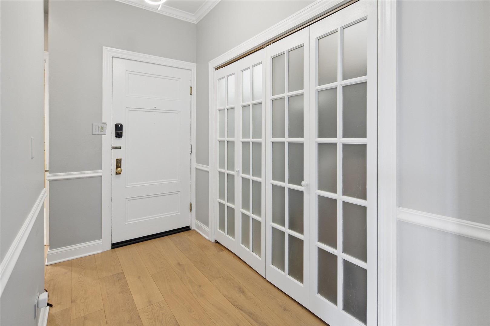 70 East Scott Street, Unit 306 Chicago, IL 60610 - Photo 15 of 17 a view of an empty room with a window