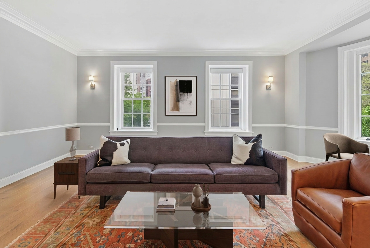 70 East Scott Street, Unit 306 Chicago, IL 60610 - Photo 4 of 17 a living room with furniture and a window