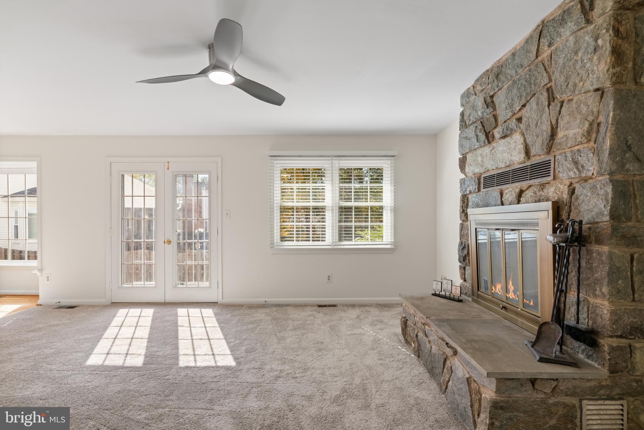 6218 Stonehunt Place Clifton, VA 20124 - Photo 15 of 37 a view of an empty room with a window