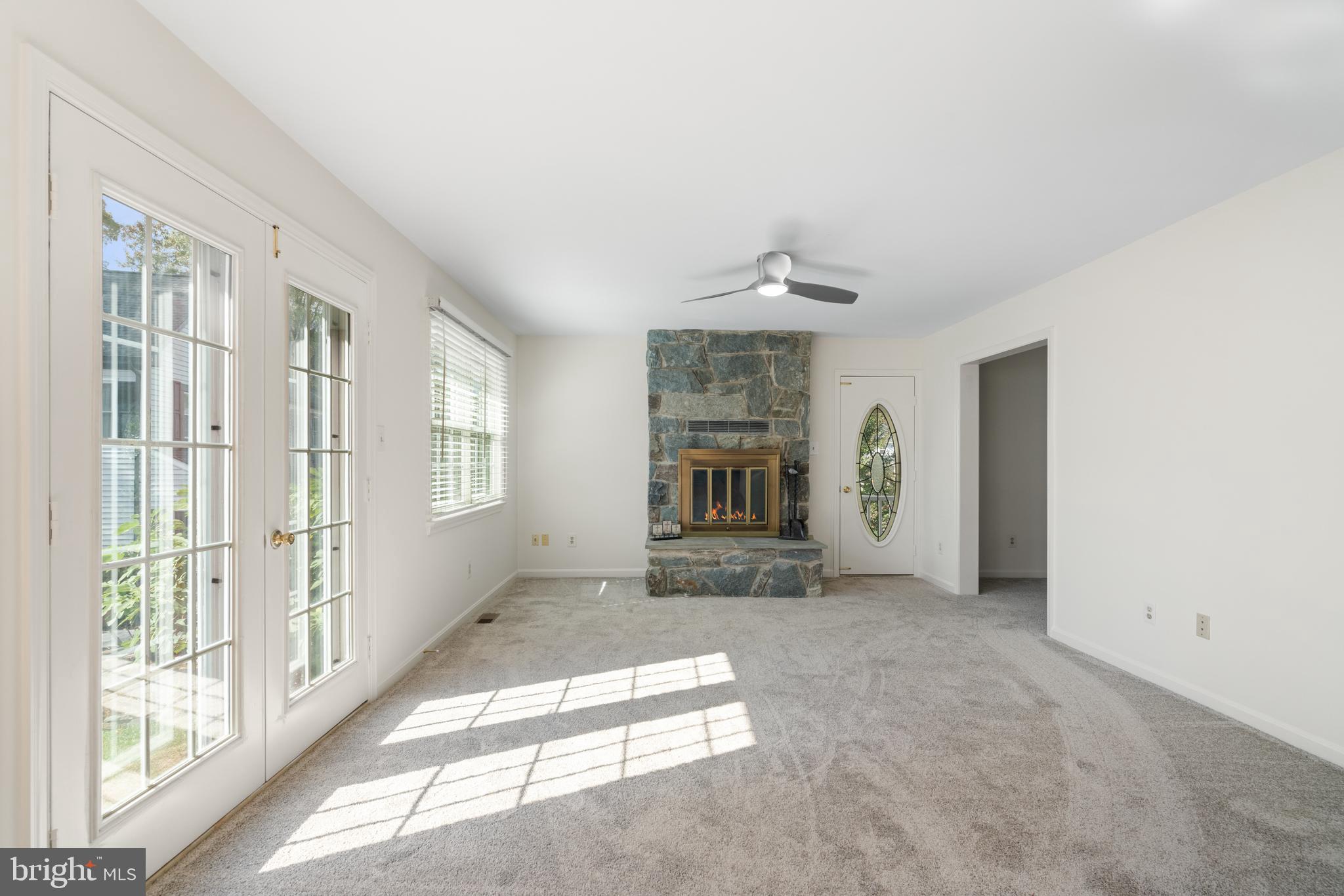 6218 Stonehunt Place Clifton, VA 20124 - Photo 16 of 37 a view of an empty room with a window