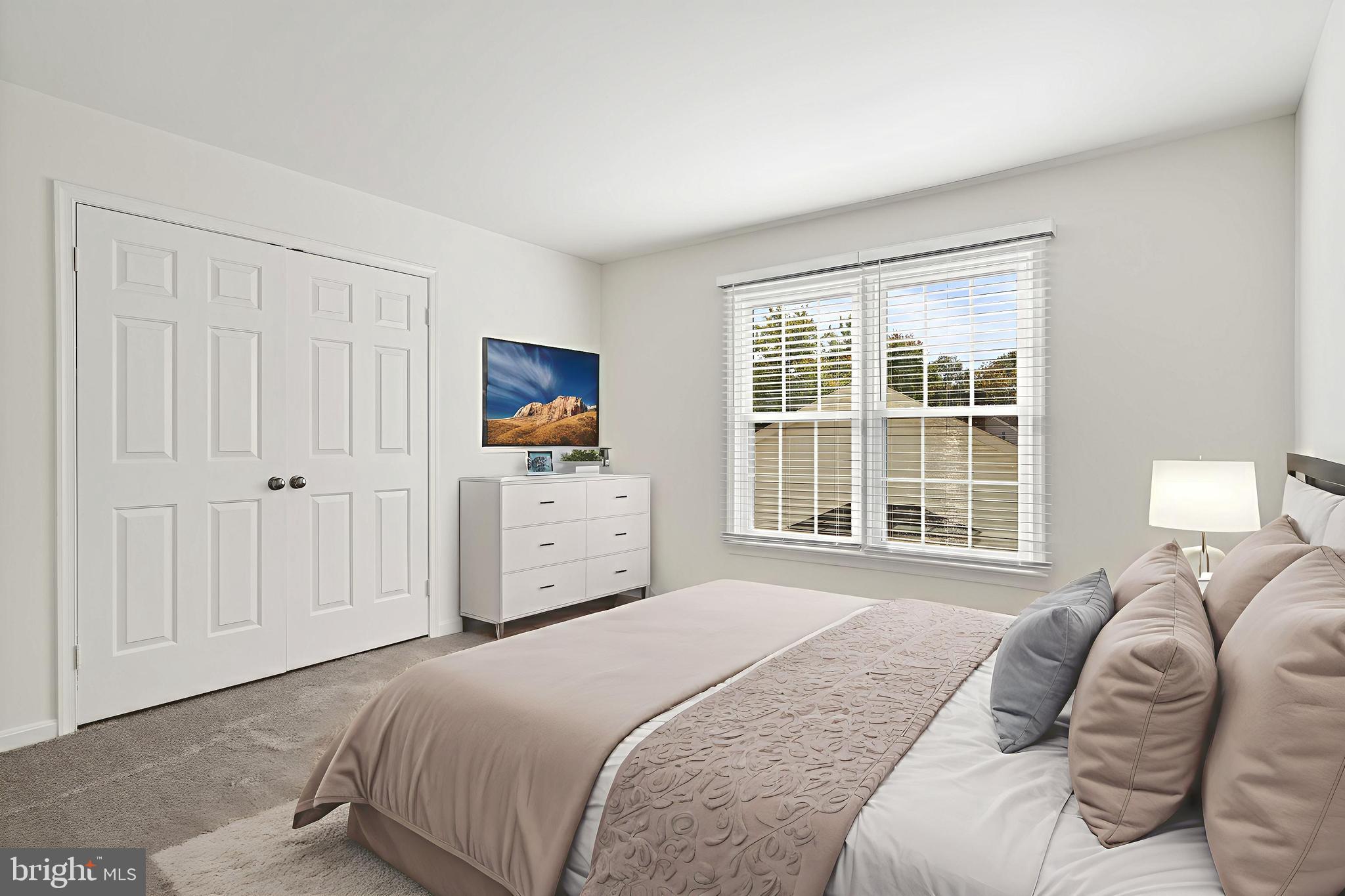 6218 Stonehunt Place Clifton, VA 20124 - Photo 23 of 37 a bedroom with a bed and a window