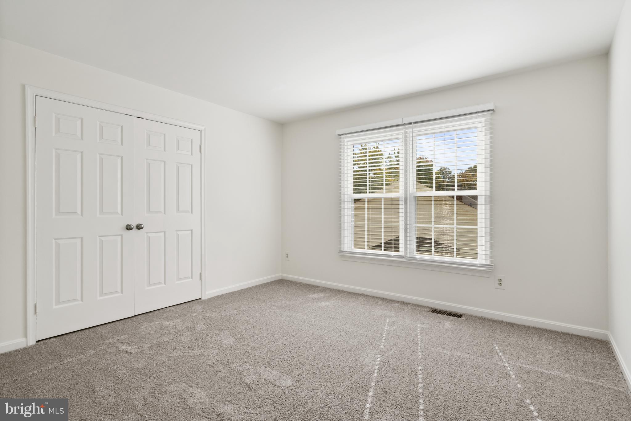 6218 Stonehunt Place Clifton, VA 20124 - Photo 24 of 37 an empty room with a window