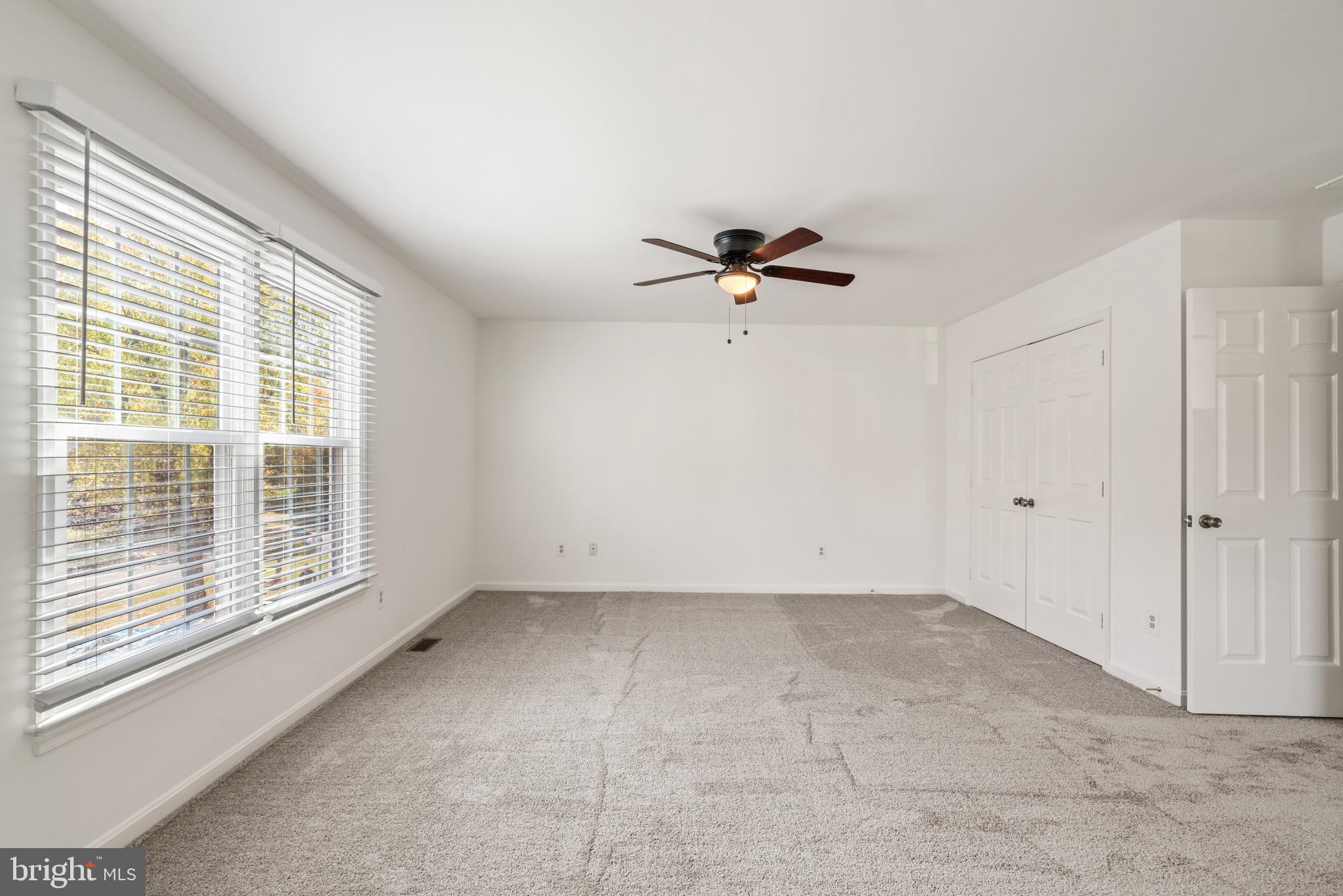 6218 Stonehunt Place Clifton, VA 20124 - Photo 30 of 37 a view of an empty room with a window