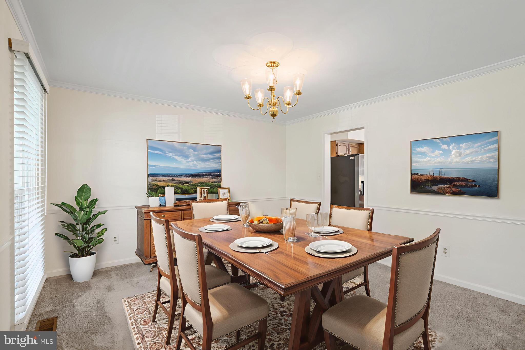 6218 Stonehunt Place Clifton, VA 20124 - Photo 10 of 37 a view of a dining room with furniture window and wooden floor