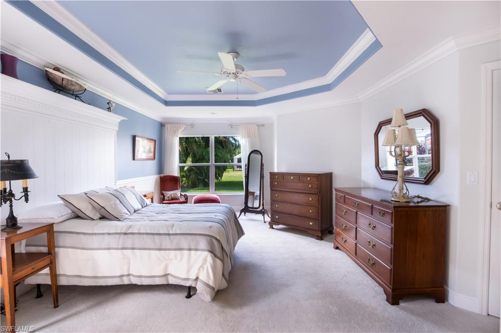 19741 Villa Rosa Loop Estero, FL 33967 - Photo 11 of 21 a bedroom with a bed dresser and a window