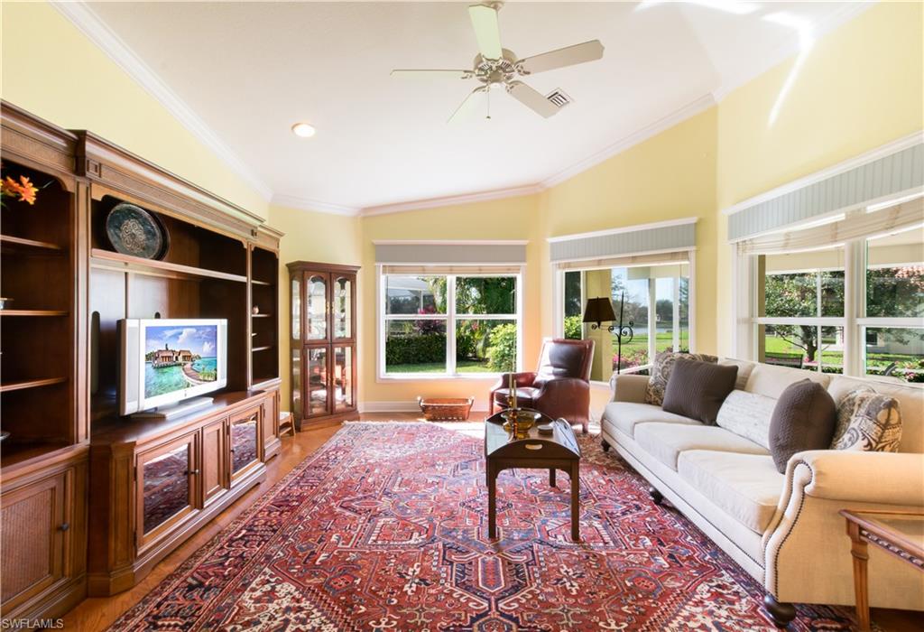19741 Villa Rosa Loop Estero, FL 33967 - Photo 9 of 21 a living room with furniture tv and a large window