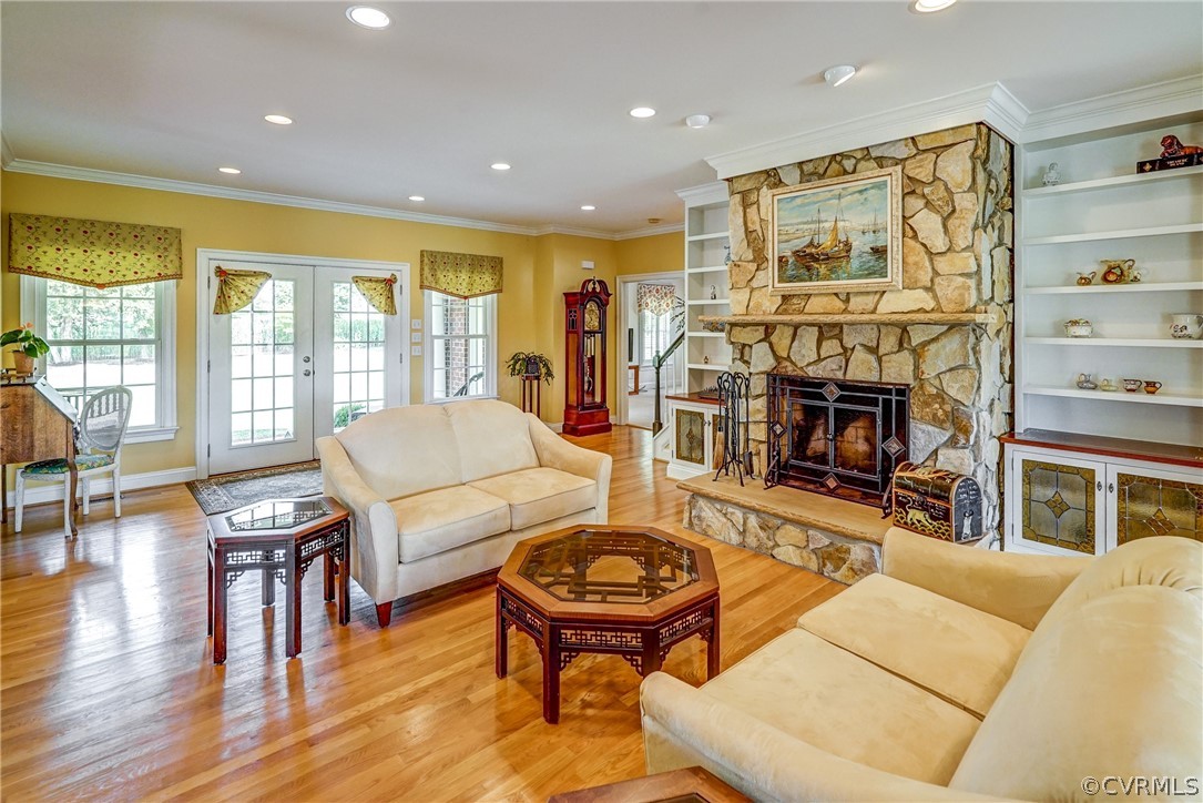 11351 Hillcrest Road Hanover, VA 23069 - Photo 13 of 48 a living room with furniture a fireplace and a large window