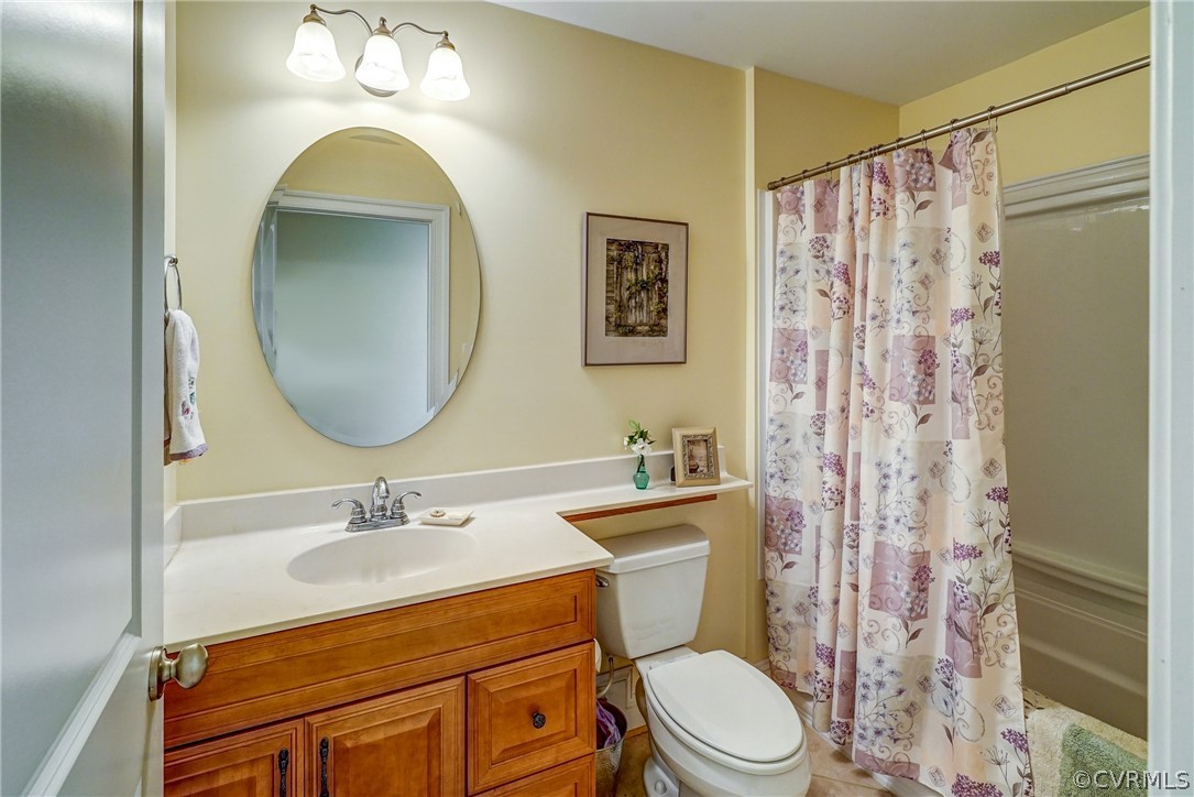 11351 Hillcrest Road Hanover, VA 23069 - Photo 31 of 48 a bathroom with a sink toilet and shower