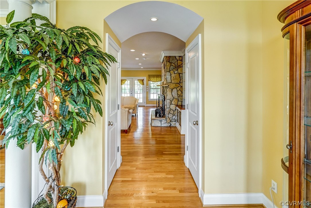 11351 Hillcrest Road Hanover, VA 23069 - Photo 6 of 48 a view of a hallway with wooden floor and staircase