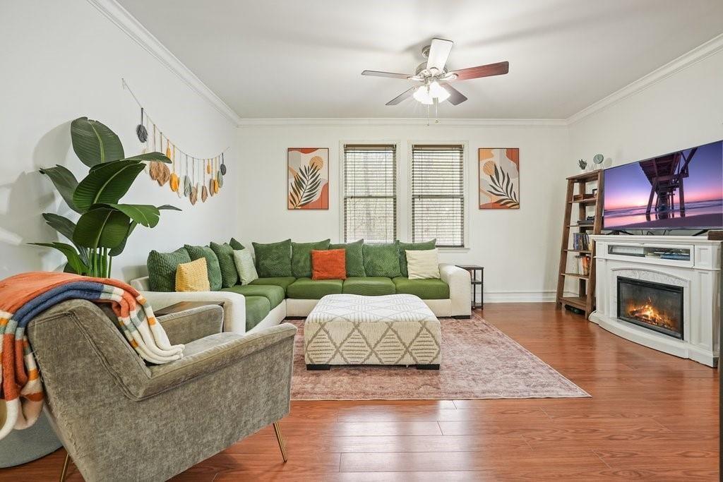 2232 Burnt Mountain Road Jasper, GA 30143 - Photo 13 of 50 a living room with furniture fireplace and a large window