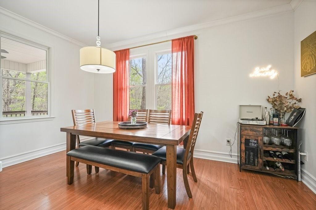 2232 Burnt Mountain Road Jasper, GA 30143 - Photo 22 of 50 a view of a dining room with furniture window and wooden floor