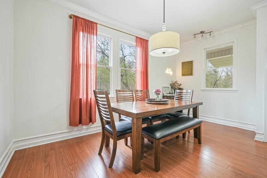 2232 Burnt Mountain Road Jasper, GA 30143 - Photo 23 of 50 a view of a dining room with furniture window and wooden floor