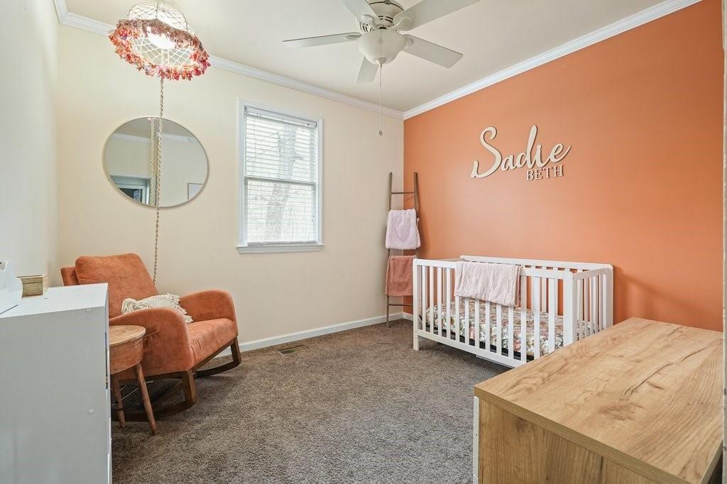 2232 Burnt Mountain Road Jasper, GA 30143 - Photo 28 of 50 a bedroom with furniture and a window