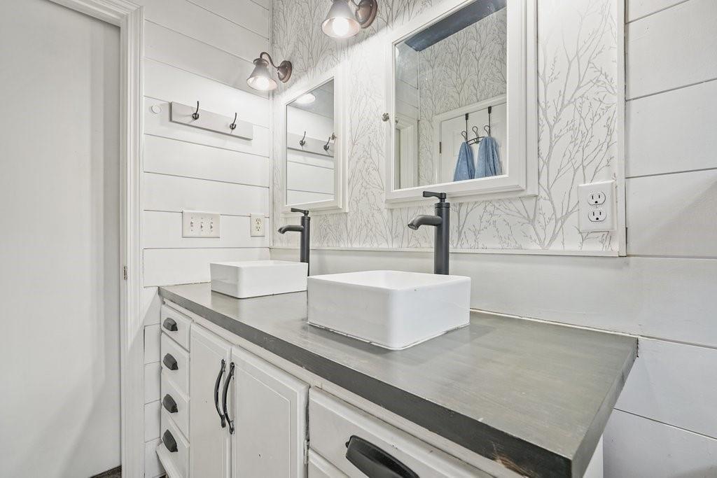 2232 Burnt Mountain Road Jasper, GA 30143 - Photo 35 of 50 a bathroom with a sink and a mirror