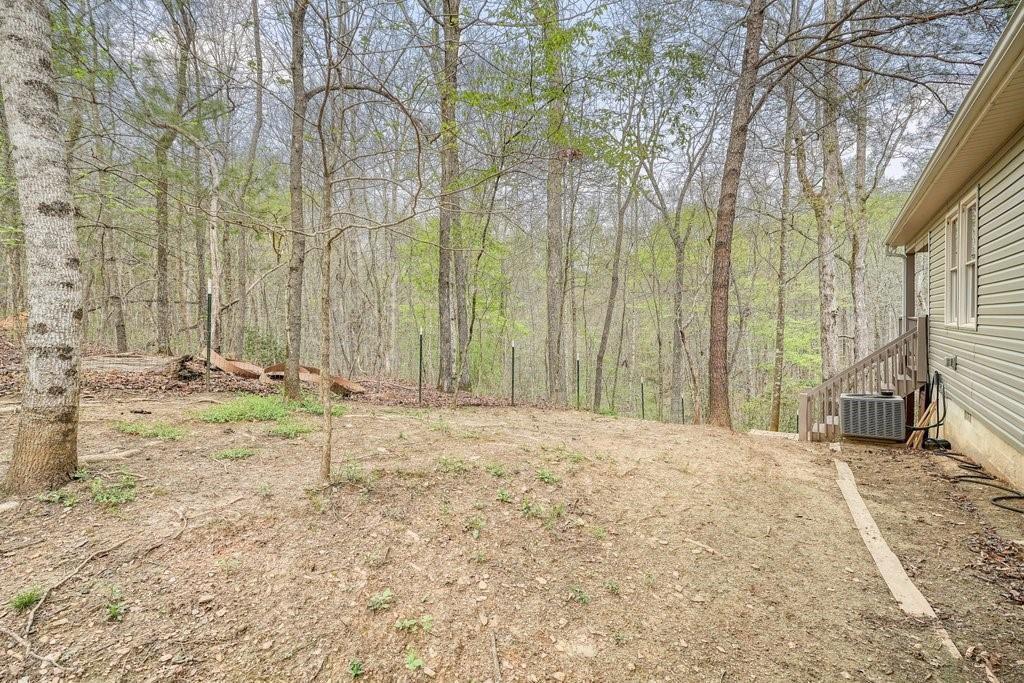 2232 Burnt Mountain Road Jasper, GA 30143 - Photo 43 of 50 a view of a backyard of the house