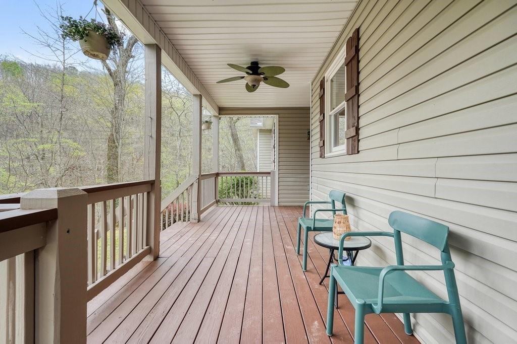 2232 Burnt Mountain Road Jasper, GA 30143 - Photo 9 of 50 a view of a balcony with furniture