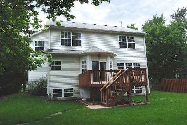 231 South Quentin Road Palatine, IL 60067 - Photo 10 of 10 a view of a house with a backyard