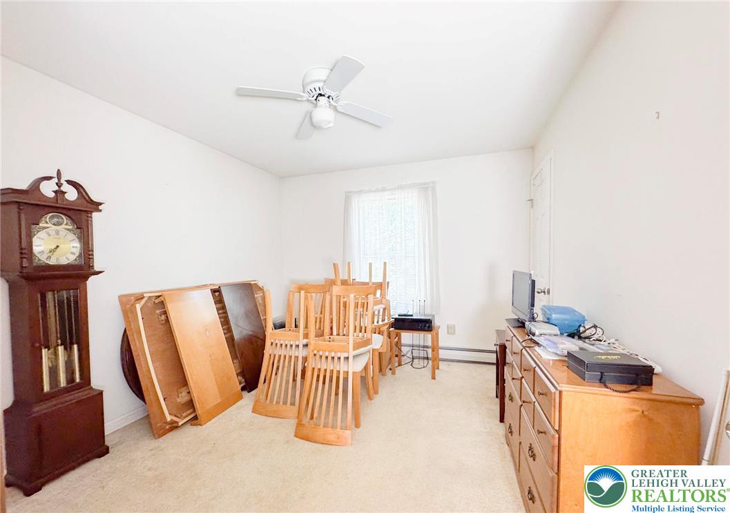 111 Turkey Ridge Kunkletown, PA 18058 - Photo 15 of 30 a living room with furniture and a clock