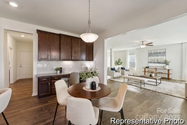 a view of a dining room with furniture