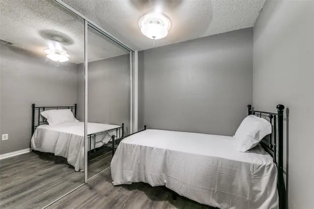 a bedroom with a bed and a table